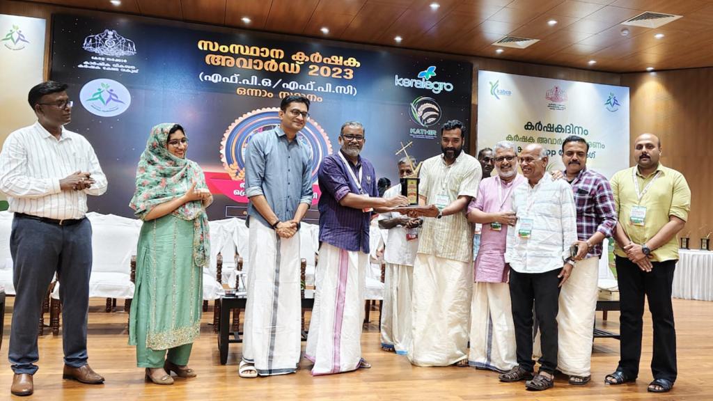 TAPCo receiving the best FPO award by the State Government of Kerala from the State's Agriculture Minister in 2024